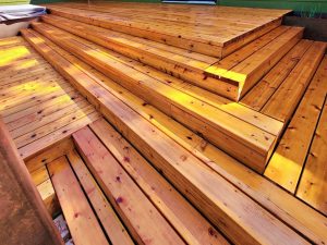 Cedar deck lifespan ranges by lot exposure and maintenance schedule