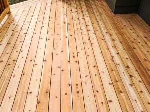 Cedar deck UV exposure aging on full-sun Austin Texas backyard