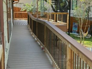Deck ledger inspection from underneath structural assessment Austin
