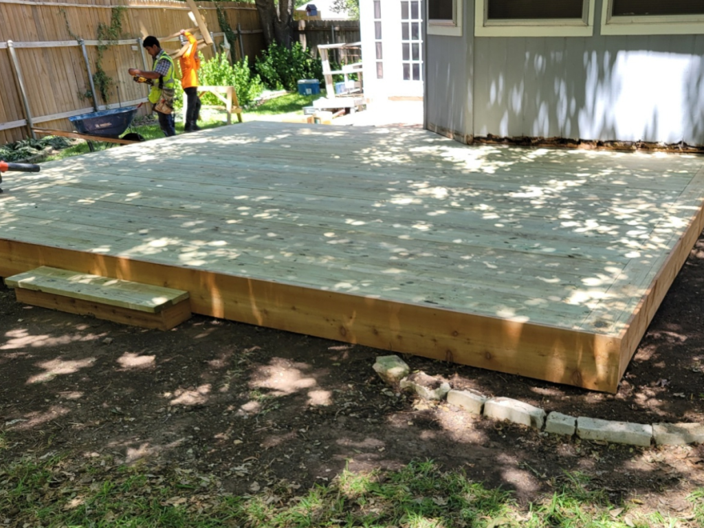 Aged Austin Texas deck during repair versus replacement assessment