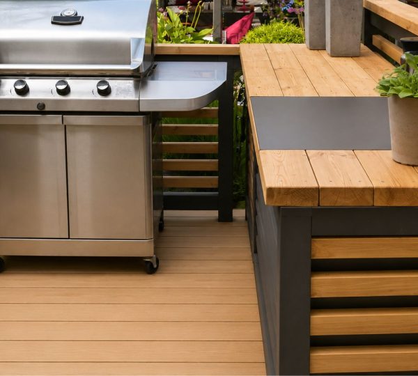 Custom deck design with outdoor kitchen integration on Austin Texas home