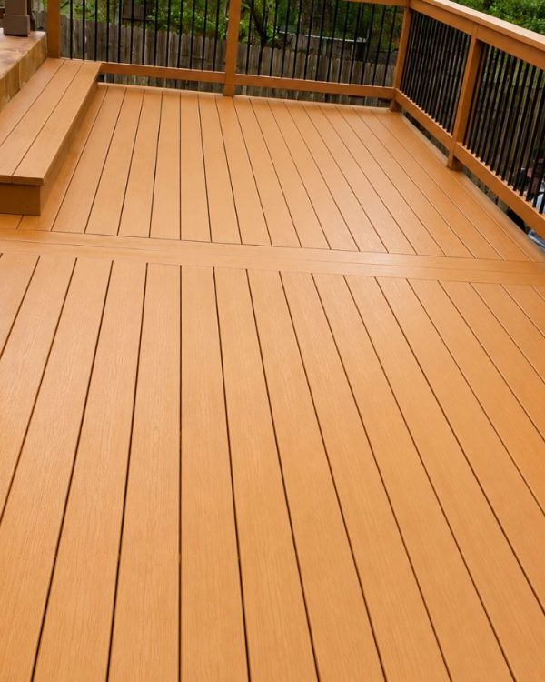 New deck installation in Austin Texas residential backyard with composite surface