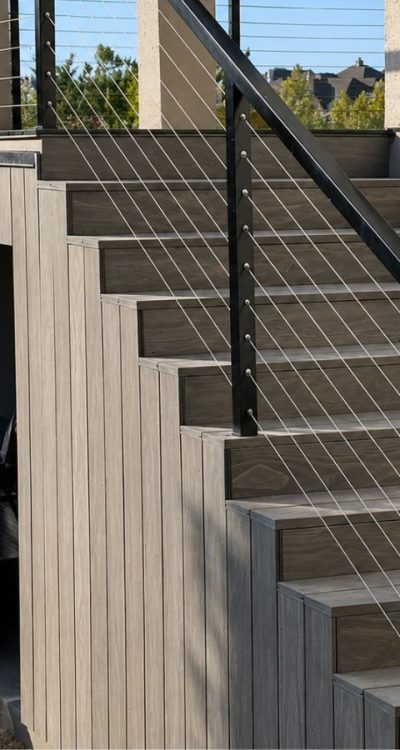Finished wood deck with new railings and stairs in Austin, Texas
