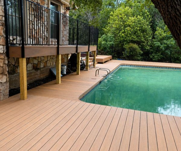 Pool deck construction in North Austin Texas residential backyard